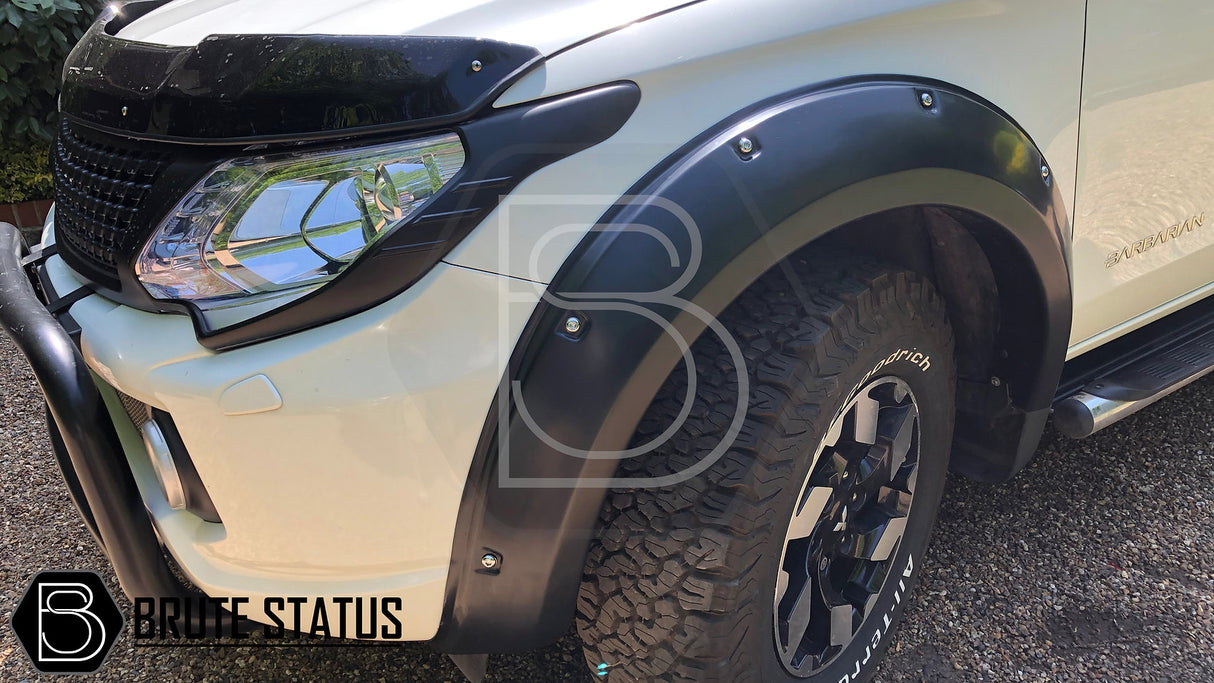 Mitsubishi L200 Series 5 2015-2019 Fender Flares shown on a close-up of a car wheel, highlighting their durable, sleek design and easy installation.