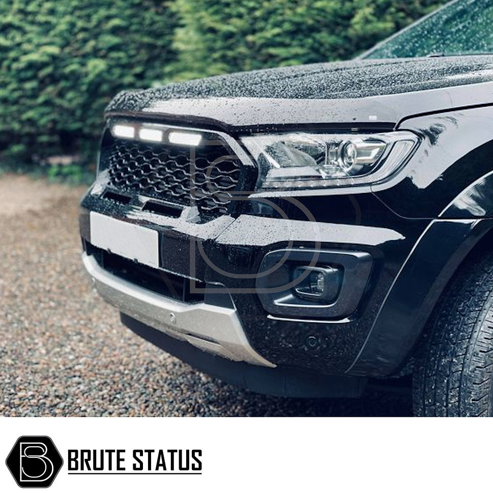 Close-up of Ford Ranger 2019-2022 T8 Gloss Black & Silver Grille (Wildtrak Only), featuring three white LEDs and sleek design, ideal for customization.