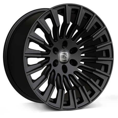 Hawke Wheels Denali XXC alloy rim featuring a central silver logo, designed for customization of pick-up trucks, available in gloss or matt black.