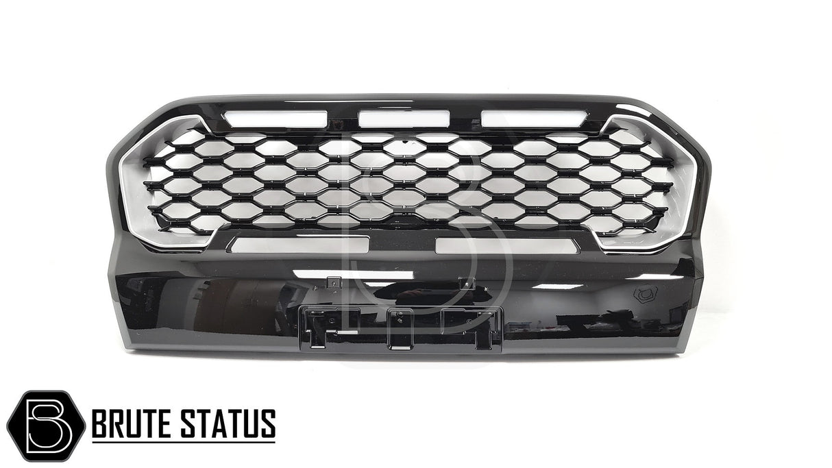 Ford Ranger 2019-2022 T8 Gloss Black & Silver Grille (Wildtrak Only) with White LEDs, showcasing a sleek design with hexagonal patterns and removable silver inserts.