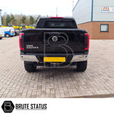 Nissan Navara NP300 2015-2022 LED Tail Lights (UK Spec) on a black truck, showcasing smoked design and easy installation.