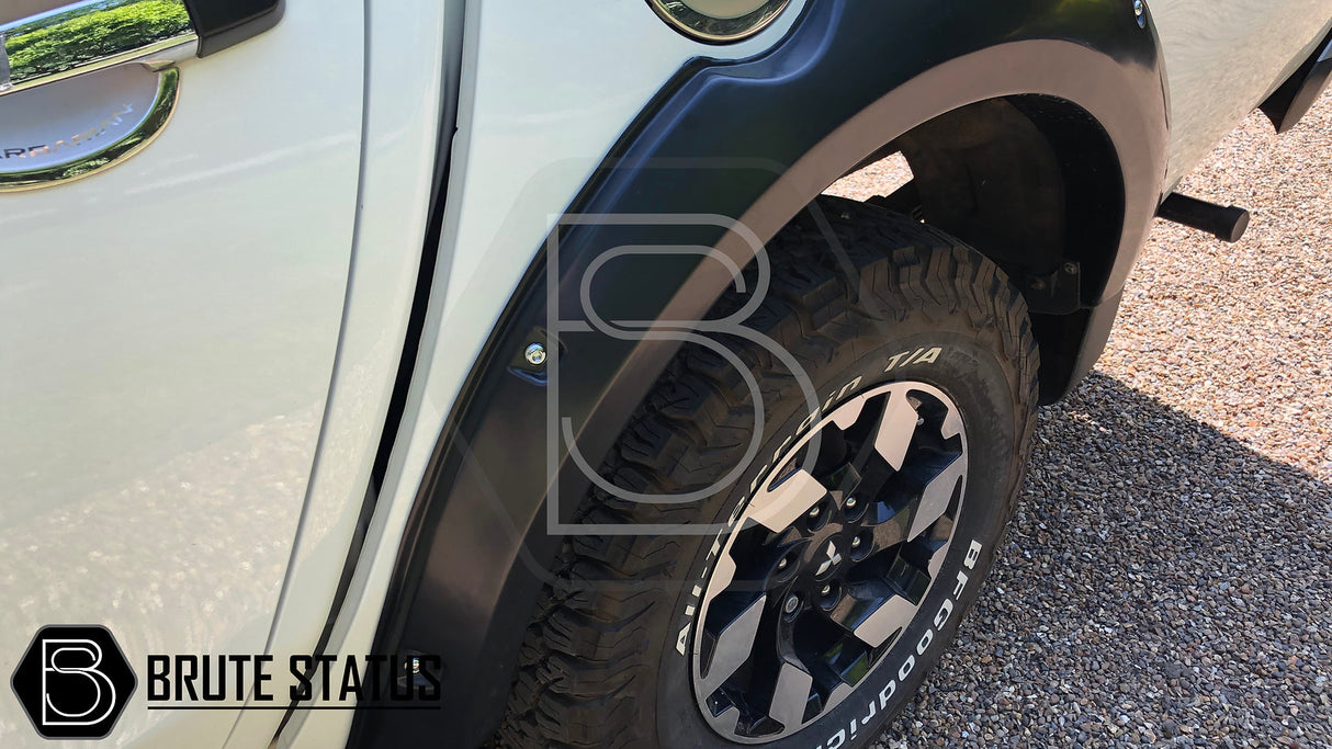 Mitsubishi L200 Series 5 2015-2019 Fender Flares, featuring robust ABS construction and faux bolts, designed for a striking, customizable truck appearance.