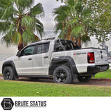 Volkswagen Amarok 2010-2022 Roll Bar Matte Black on a white truck, showcasing its robust steel construction and sleek design, enhancing vehicle's aggressive appearance.