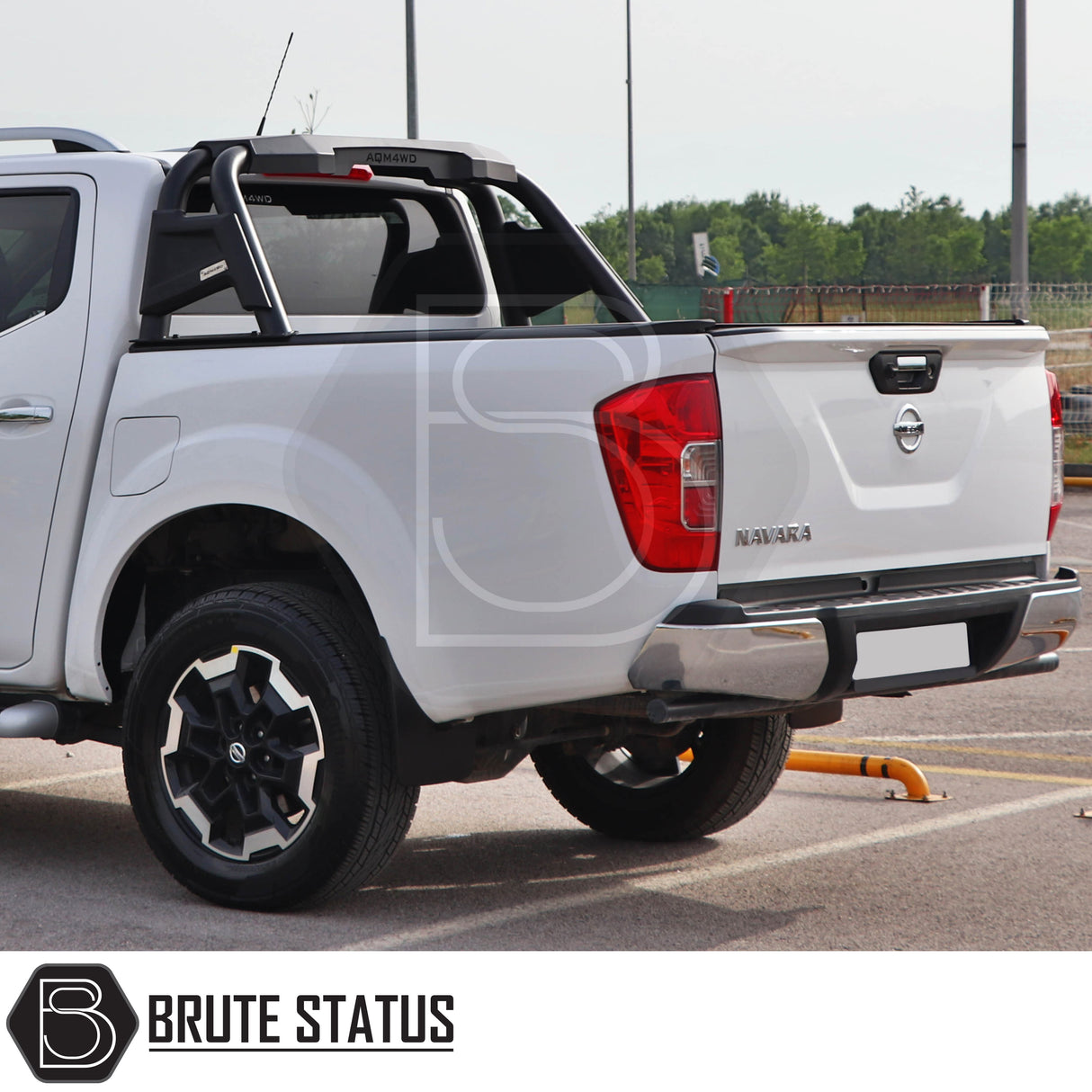 Nissan Navara NP300 2015-2022 Roll Bar Matte Black installed on a white pickup, showcasing its aggressive style and heavy-duty steel construction.