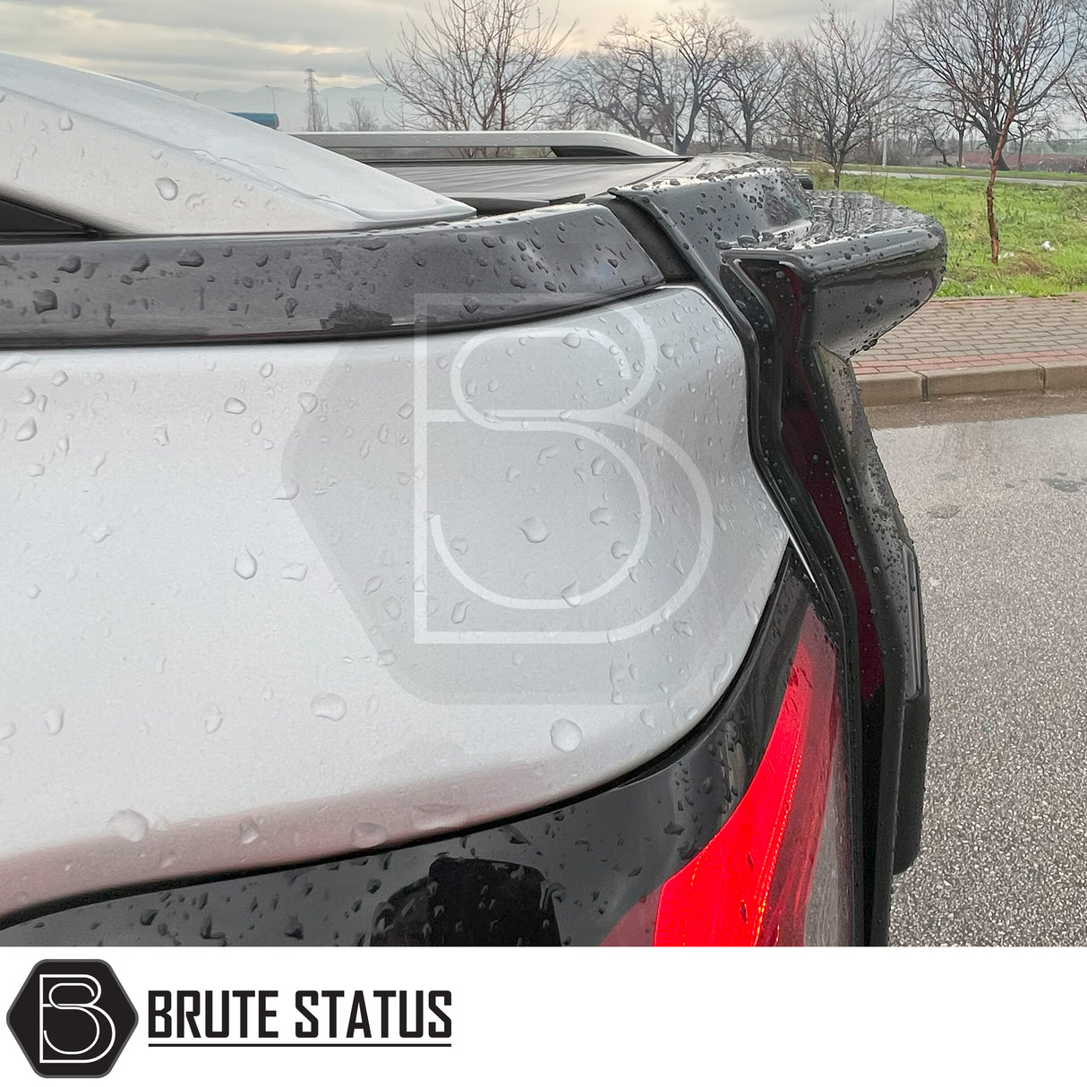 Ford Ranger 2023+ Tail Gate Cladding Protector, shown on a vehicle rear, offers durable ABS plastic protection, fits with double-sided tape, enhancing truck durability.