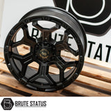 Hawke AWD Wheels Diablo in Matte Black, featuring a sleek black rim with a distinct gold logo, designed for enhanced pick-up truck customization.