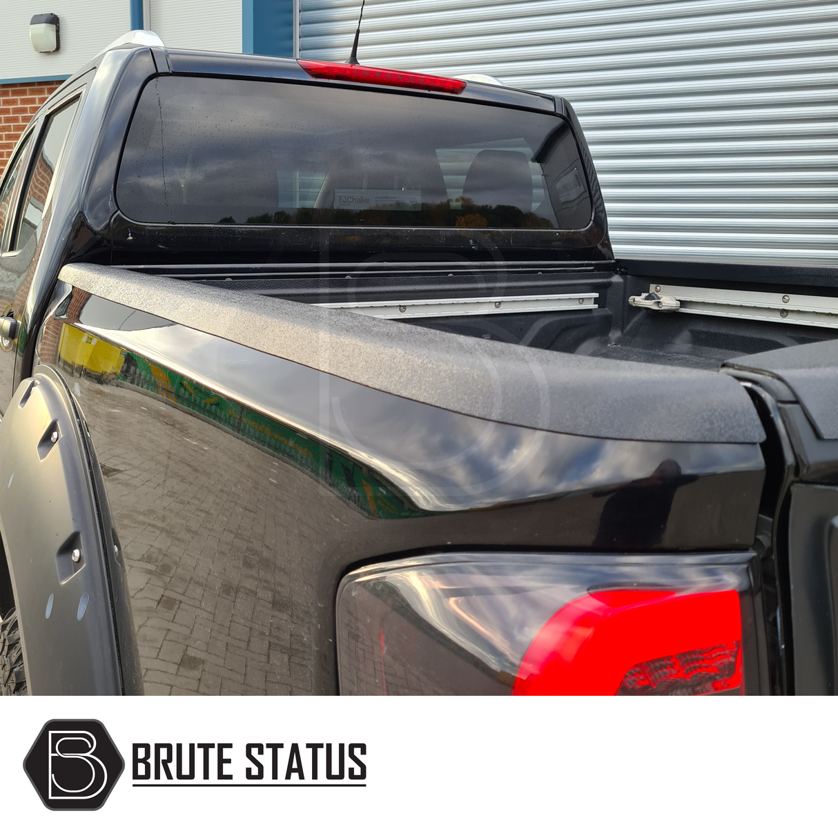 Nissan Navara NP300 2015-2022 Load Bed Rail Protector Set displayed on a black truck, showcasing its sleek, high-quality ABS plastic fitment.