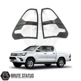 Toyota Hilux 2016-2020 Head Light & Tail Light Cover Package displayed on a white truck, highlighting easy-fit ABS plastic covers for customization.