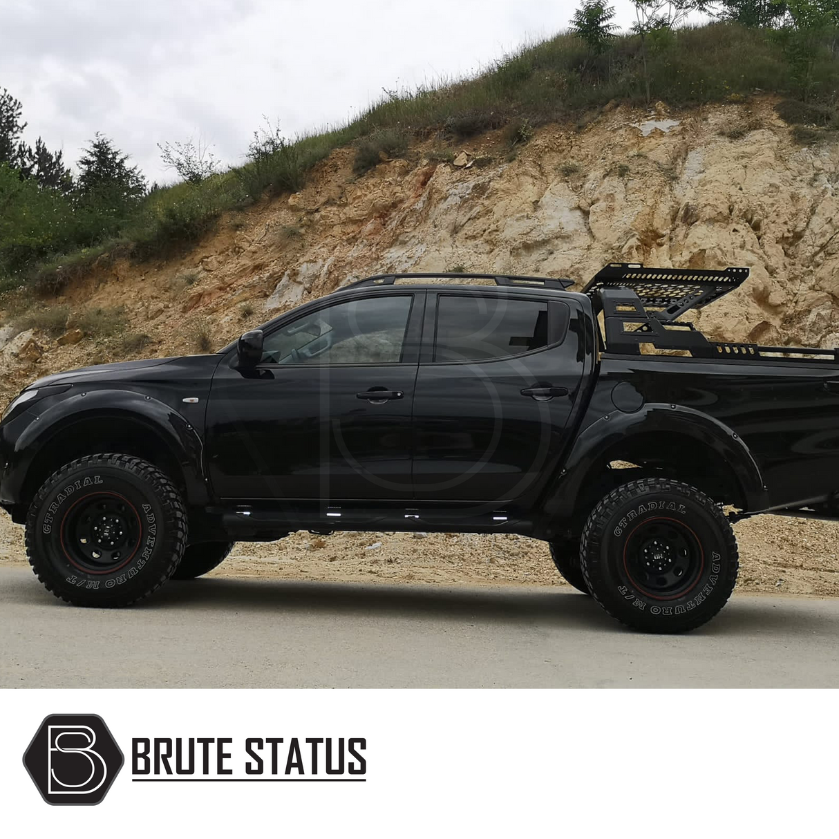 Fiat Fullback 2015-2019 Wide Arch Kit (Overland Extreme) installed on a black truck, showcasing premium, durable ABS wheel arches for enhanced style and functionality.