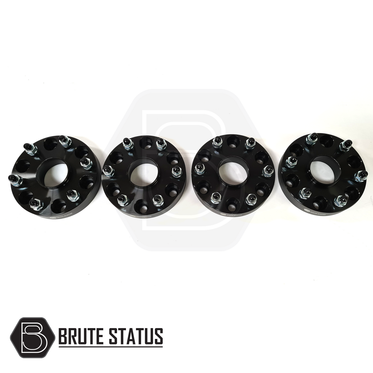 Fiat Fullback 2015-2019 35mm hubcentric wheel spacers set of 4, featuring black metal construction with pre-installed bolts and included nuts for enhanced vehicle stability.