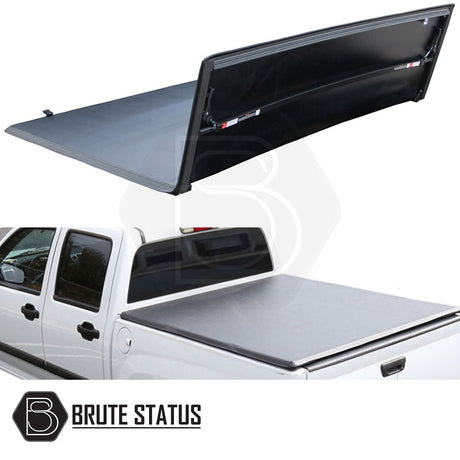 Nissan Navara D40 2005-2015 Tonneau Cover with tri-fold design, showcasing durable vinyl material and secure aluminum rear catch for enhanced truck bed protection.