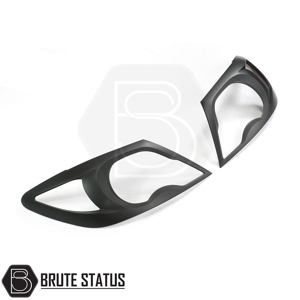 Toyota Hilux 2005-2011 Matt Black Head Light Covers, featuring a high-impact plastic design with easy-fit adhesive, enhancing your truck's aggressive style.