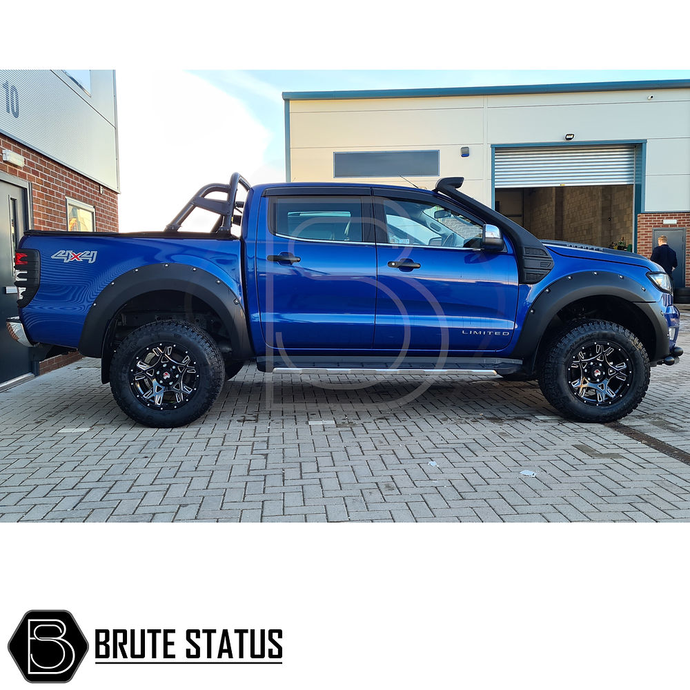 Ford Ranger 2016-19 Wide Arch Kit (Riveted Style) enhances the truck's appearance with durable ABS plastic arches, mimicking the F150 Raptor's aggressive style.