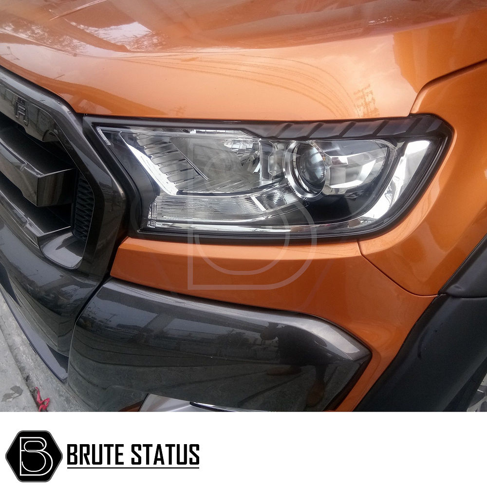 Ford Ranger 2015-2022 T7 T8 Head Light Covers Matte Black, showcasing a close-up of the aggressive headlight design transformation for enhanced truck style.