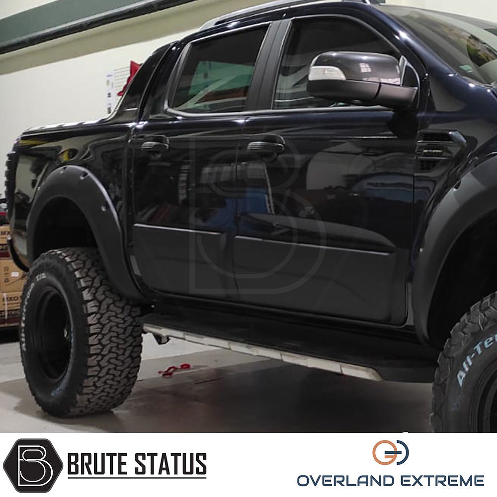 Ford Ranger 2012-2022 Matte Black Wide Arch Kit, featuring large tires and premium ABS plastic, designed for double cab models with precision fitment and durability.