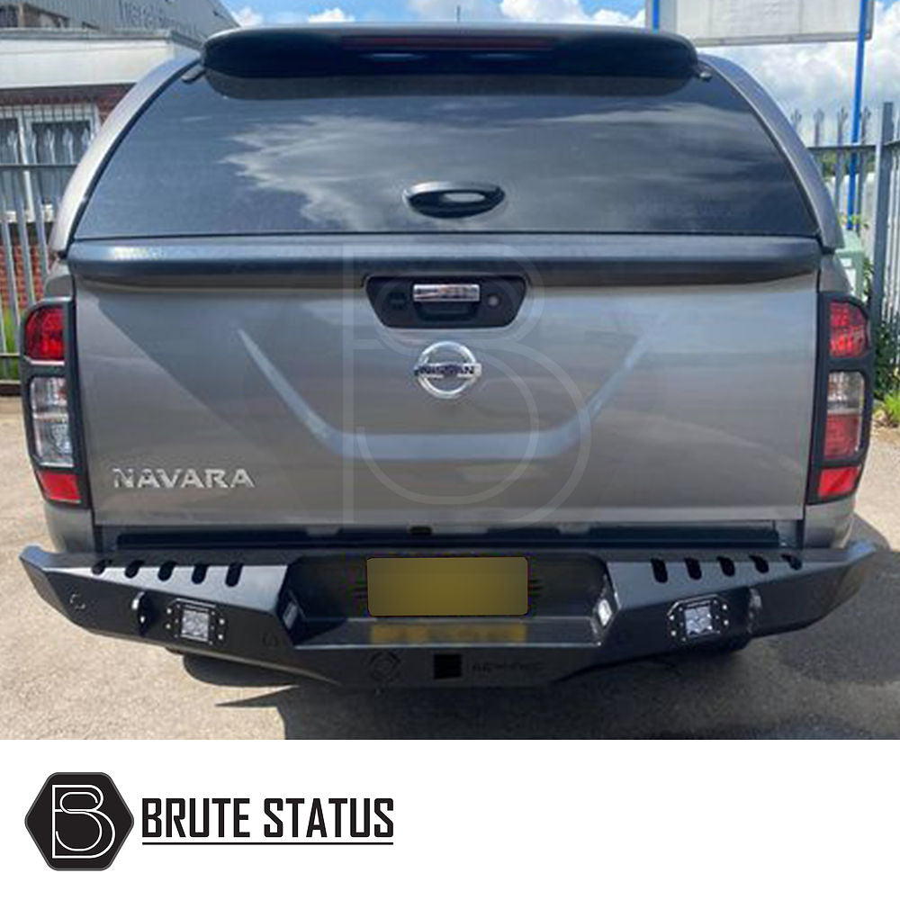 Nissan Navara D40 2010-2015 rear bumper in matt black, featuring knock-out sensor holes and lights, designed to enhance style and protection.