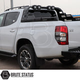 Mitsubishi L200 Series 5 2015-2019 X10 Combat Roll Bar with LED Lights, enhancing truck's aggressive style, shown mounted on a white vehicle, highlighting its sturdy construction.