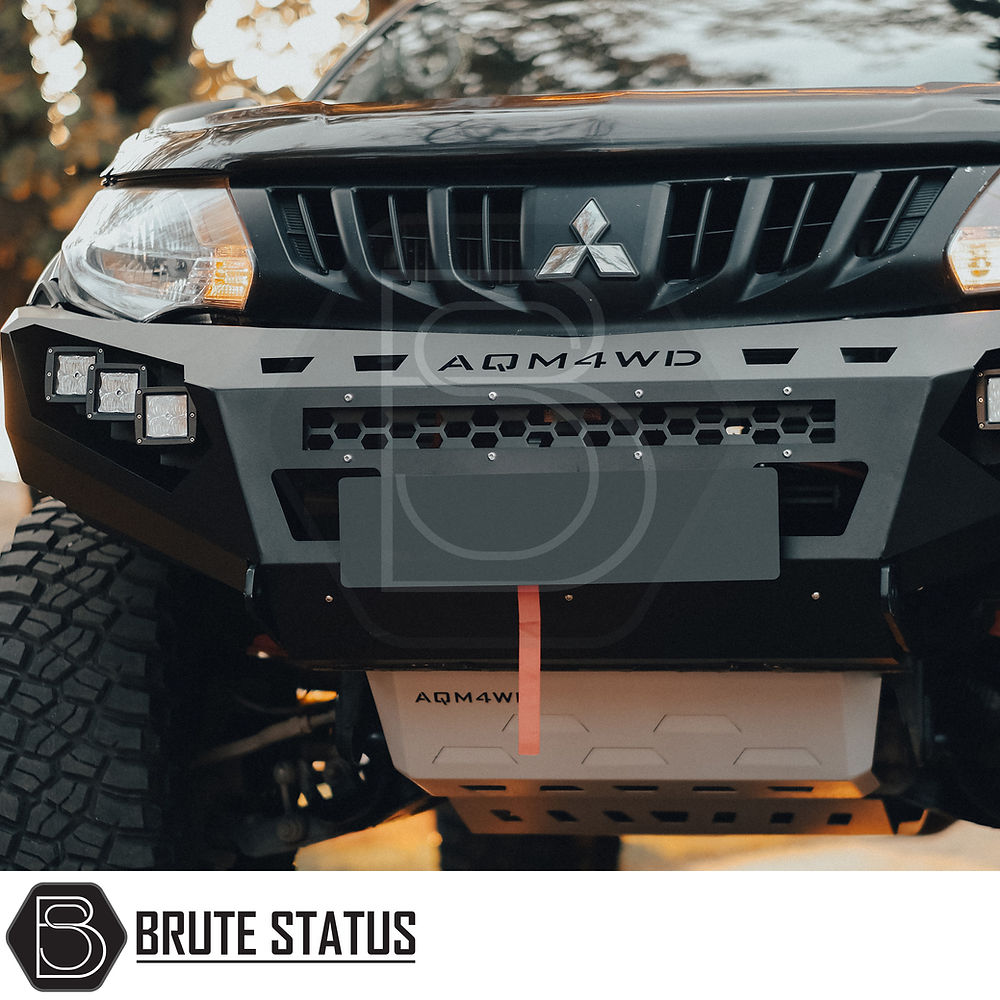 Mitsubishi L200 MK5 2015-2019 Heavy Duty Winch Front Bumper with matte black finish, LED lights, and winch space. Ideal for off-road enhancements.