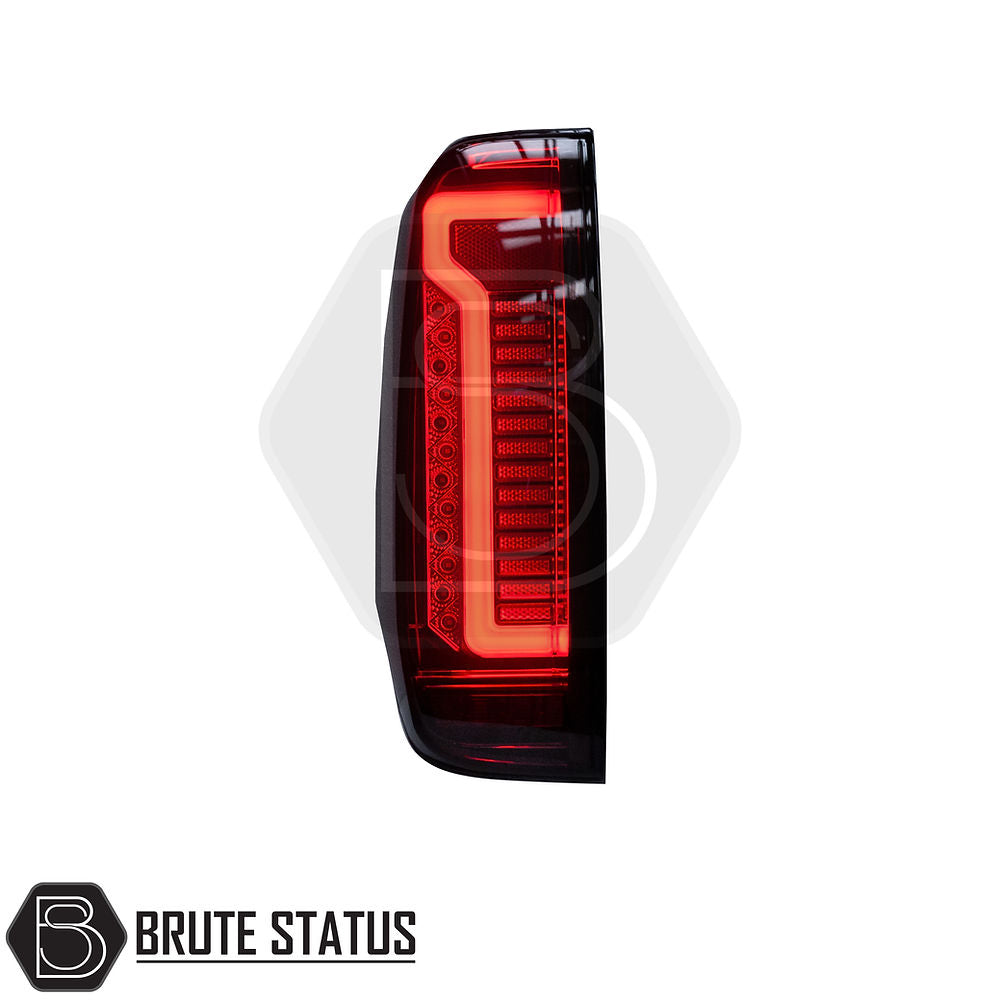 Nissan Navara D40 2006-2014 LED Tail Lights, aftermarket design, close-up of one red light, enhancing truck aesthetics with easy installation for a unique look.