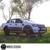 Nissan Navara NP300 2015-2022 Bull Bar (Nudge Bar) Matt Black on a white truck in a grassy field, enhancing protection and style.