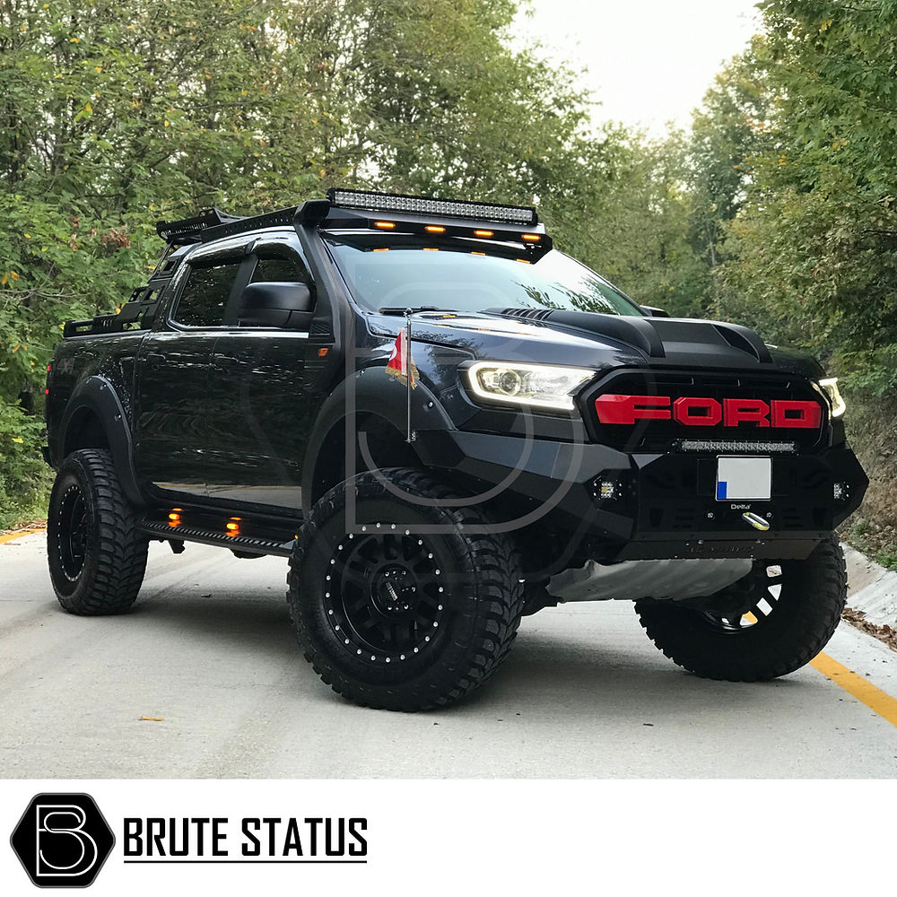 Ford Ranger 2023+ Heavy Duty S30 Steel Side Steps with LEDs, showcasing durable matte black design, fitted on a truck with visible headlights and tires.