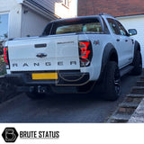 Ford Ranger 2016-19 Wide Arch Kit (Riveted Style) showcased on a white truck, highlighting the durable, stylish design with black finish and bold arches.