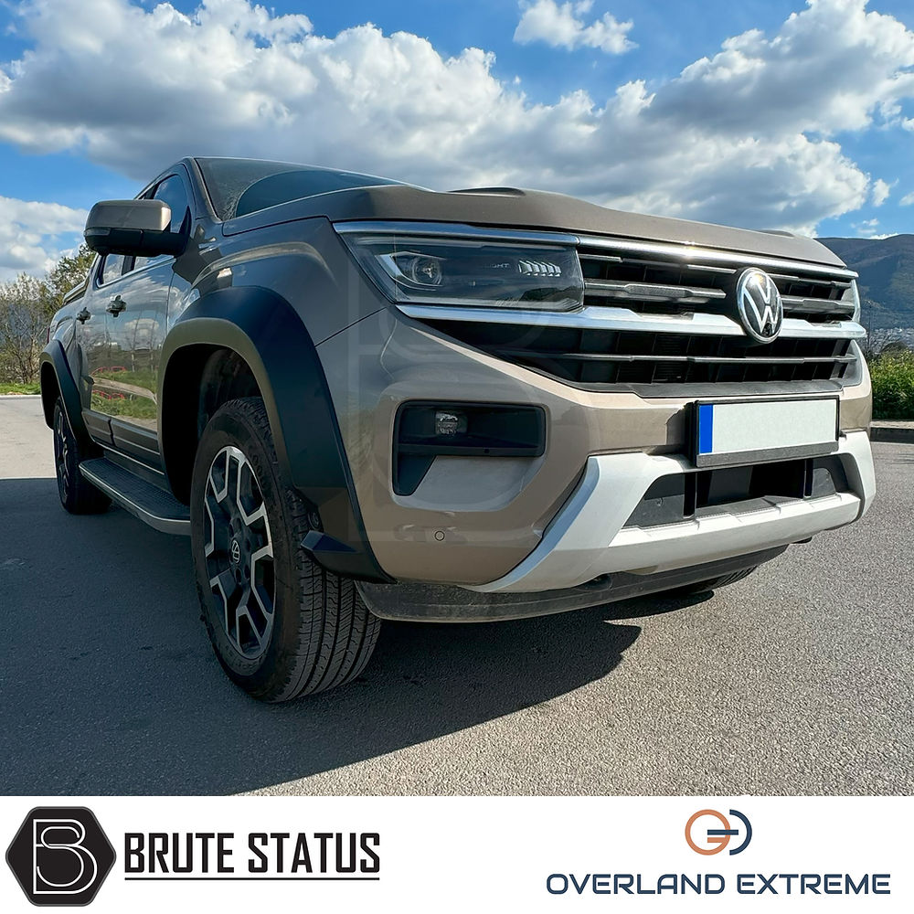 Volkswagen Amarok 2023+ Matte Black Wide Arch Kit, featuring premium ABS plastic and precise fitment, parked in a lot showcasing Overland Extreme quality.