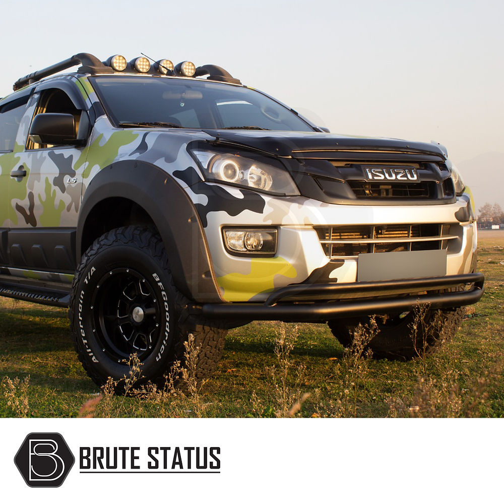 Isuzu D-Max 2012-2021 City Bar/Nudge Bar Matt Black, featuring premium Overland Extreme wheel arches, parked outdoors highlighting its rugged design and precise fitment.