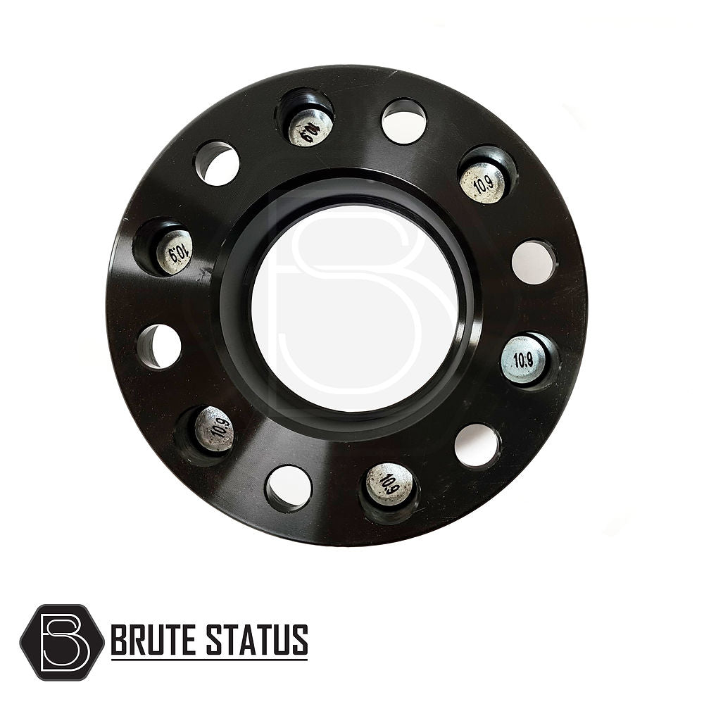 Fiat Fullback 2015-2019 50mm hubcentric wheel spacers, black circular design with holes, showcasing robust construction for enhanced vehicle stability. Set of 4 includes 24 nuts.