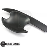 Ford Ranger 2012-2022 Matt Black Door Handle Inserts, featuring a sleek design with adhesive backing, made from durable ABS plastic for easy installation and lasting quality.