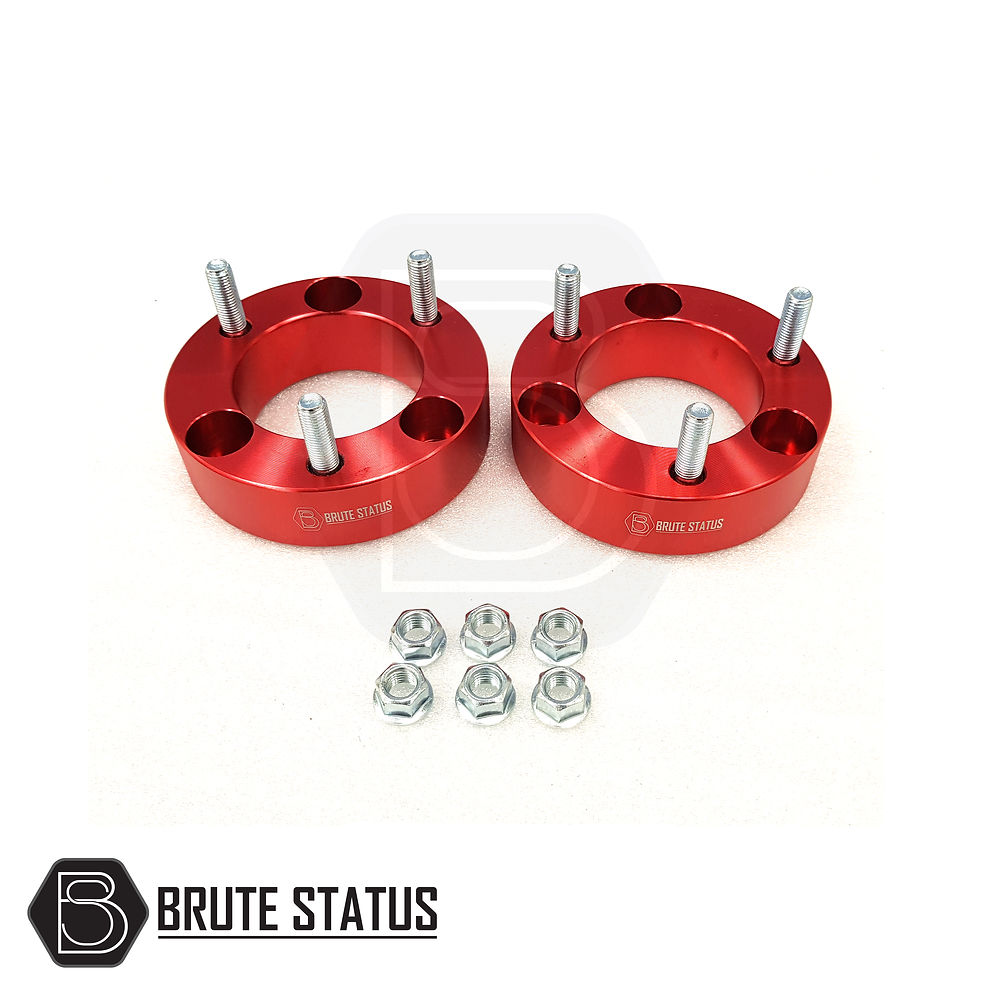 Nissan Navara D40 2005-2015 Front Shock Suspension Spacers 32mm, red metal rings with screws, enhance truck lift and durability.