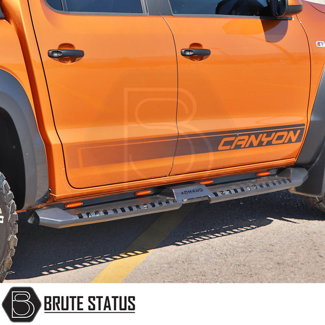 Ford Ranger 2012-2022 Heavy Duty S32 Side Steps With LEDs, shown in close-up on a vehicle, highlighting the robust steel construction and matt black finish.