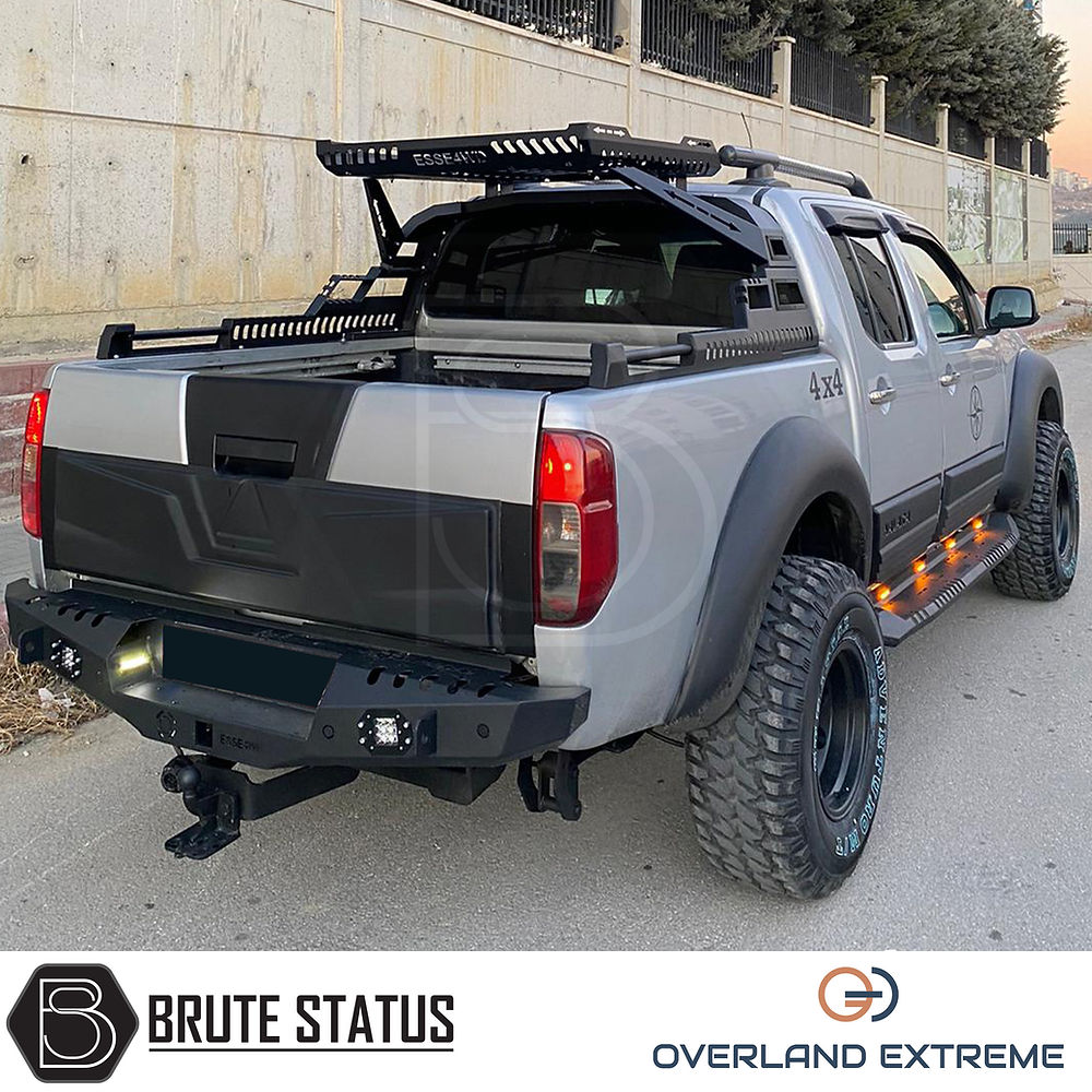 Nissan Navara D40 2010-2015 Overland Extreme Wide Arch Kit showcasing fitted wheel arches, enhancing vehicle's exterior with durable ABS plastic and precise design.