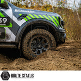 JR Wheels JRX11 on a dirt road, showcasing its tread and design, perfect for off-roading and enhancing a vehicle's rugged appeal.