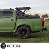 Volkswagen Amarok 2023+ S10 Combat Roll Bar with Storage Basket installed on a parked green truck, showcasing its heavy-duty steel construction and stylish practicality.