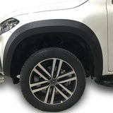 Mercedes X-Class 2017-2020 Wide Arch Kit & 35mm Wheel Spacers, showcasing close-up of tire and alloy wheel, enhancing style and stability for your truck.