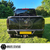 Nissan Navara NP300 2015-2022 LED Tail Lights installed on a black truck, showcasing the sleek, smoked design enhancing the vehicle's rear aesthetic.