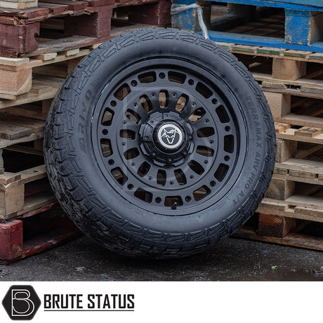 Wolfrace Explore Matt Black Alloy Wheels and Tyres Package on a pallet, featuring Terramax ARV Pro tyres with pre-installed TPMS, ideal for trucks.