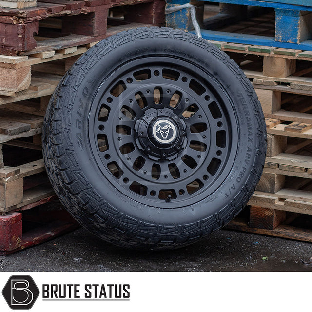 Wolfrace Explore Matt Black Alloy Wheels and Tyres Package on a pallet, featuring Terramax ARV Pro tyres with pre-installed TPMS, ideal for trucks.