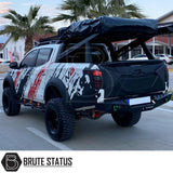 Mitsubishi L200 2019-2021 tailgate cladding cover, matte black, shown on truck for durability and protection. Ideal aftermarket accessory for customization.