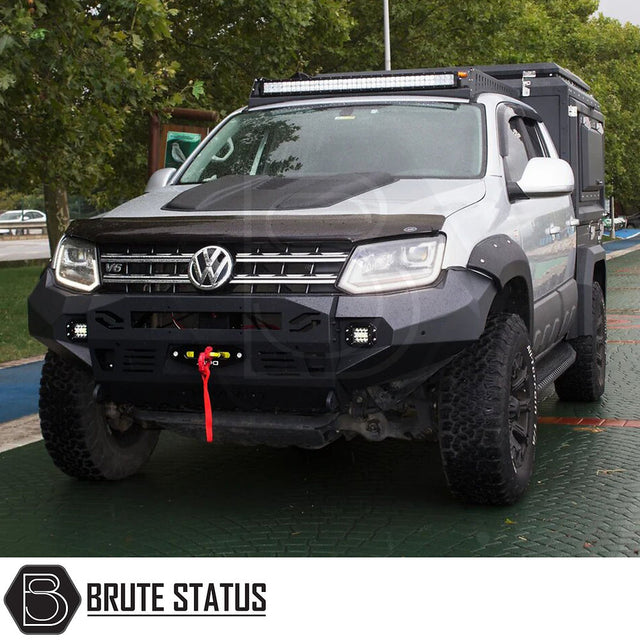 VW Amarok 2010-2016 Heavy Duty Winch Front Bumper with matte black finish, LED lights, and space for winch installation, suitable for off-road enhancements.