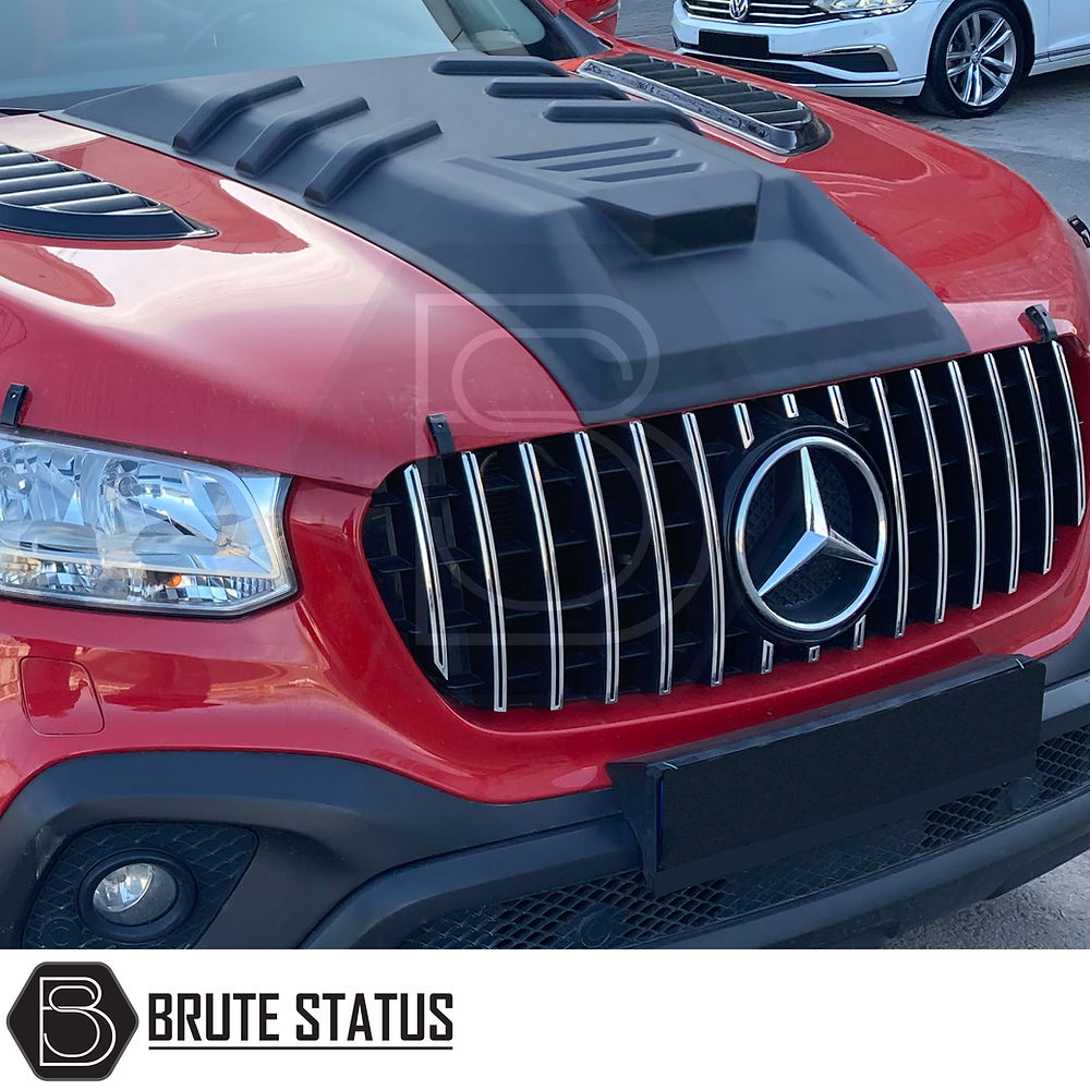 Mercedes X-Class 2017-2020 Bonnet Scoop, shown on a red car's front, enhances style and aerodynamics with its durable ABS plastic and easy installation.