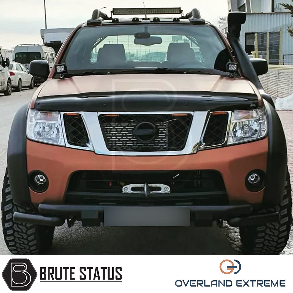 Nissan Navara D40 2010-2015 Overland Extreme Wide Arch Kit showcased on a vehicle, highlighting its robust design and precise fitment for enhanced customization.