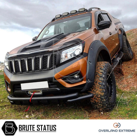 Nissan Navara NP300 2016+ Wide Arch Kit (Overland Extreme) showcased on a truck, highlighting durable ABS wheel arches with a rugged, textured finish for enhanced style.