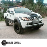 Fiat Fullback 2015-2019 Bonnet Scoop, a sleek accessory for enhanced style, shown on a white truck, emphasizing rugged design and easy installation.