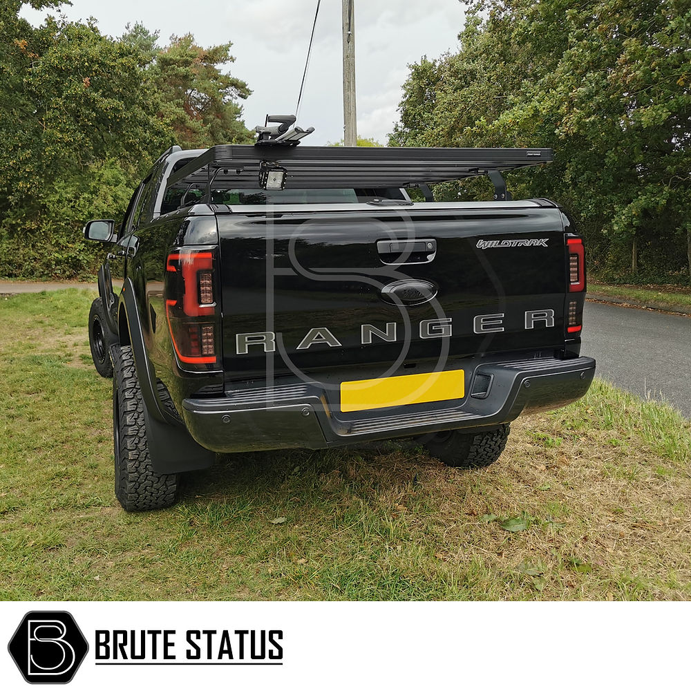 Ford Ranger 2012-2022 LED Rear Tail Lights, shown on a parked black truck, highlighting their sleek design and compatibility with UK specifications.