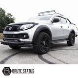 Fiat Fullback 2015-2019 Window Deflector Sun Shade, visible on a parked truck, offers aerodynamic design, durability, and easy installation for enhanced rain protection.