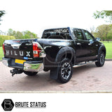 Toyota Hilux 2018-2020 Wheel Arch Kit (Riveted Style) on a black truck, featuring durable, textured black finish with fitting kit for easy installation.