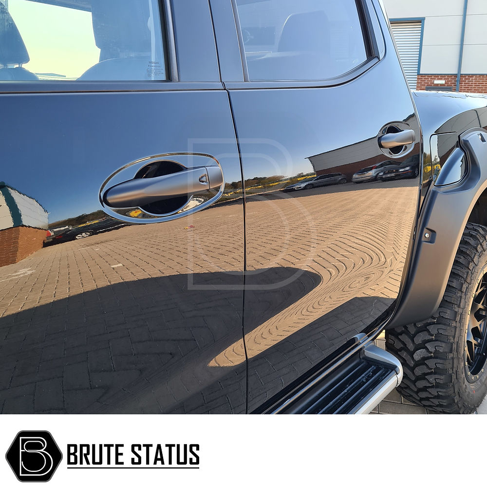 Nissan Navara NP300 2015-2022 Door Handle Covers in matt black, showcasing a close-up of a car door handle for easy installation.