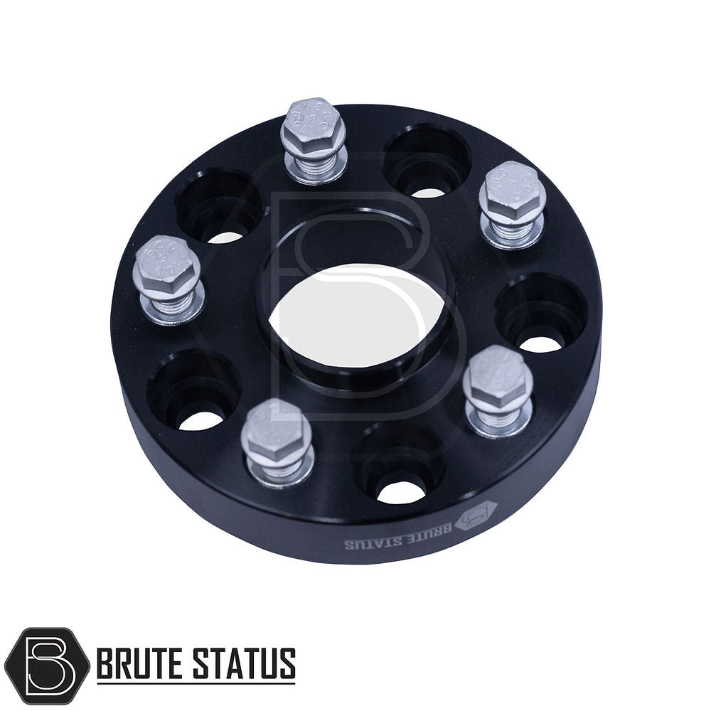 VW Amarok 2010-2022 30mm Hubcentric Wheel Spacers Set of 4, featuring black metal construction, bolts, and nuts, enhancing vehicle track and stability.